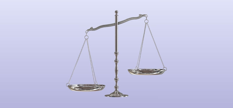 A silver balance scale showing an imbalance, set against a clean purple background.
