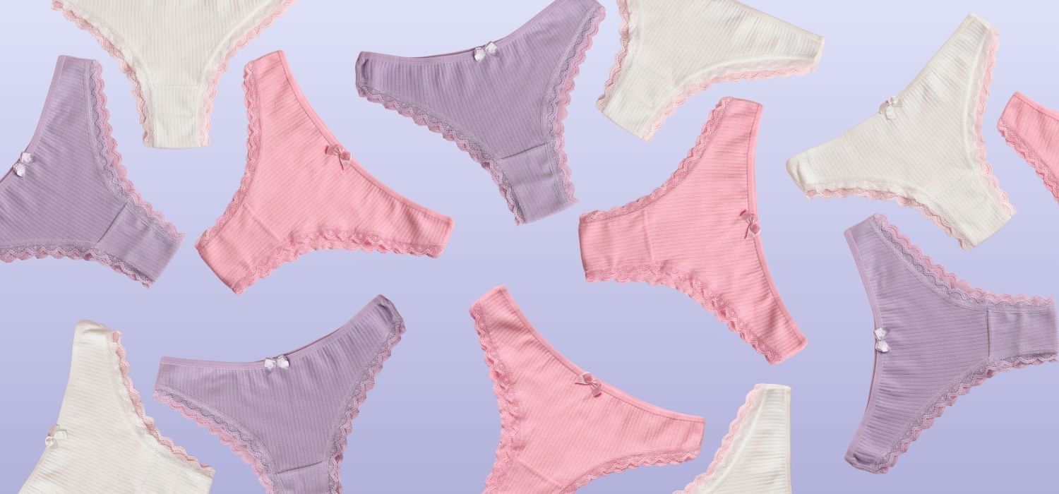 An image of multiple pairs of women's underwear in pink, purple and white, on a periwinkle background.