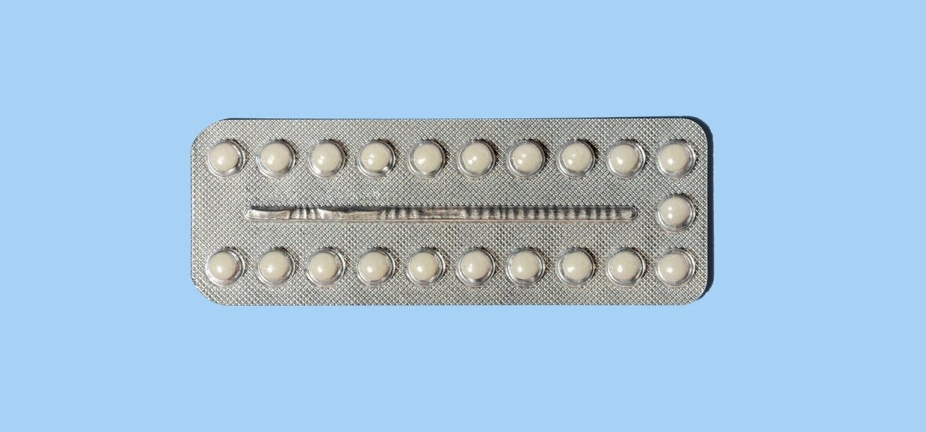A silver blister pack containing 21 small white pills, centered on a solid light blue background.