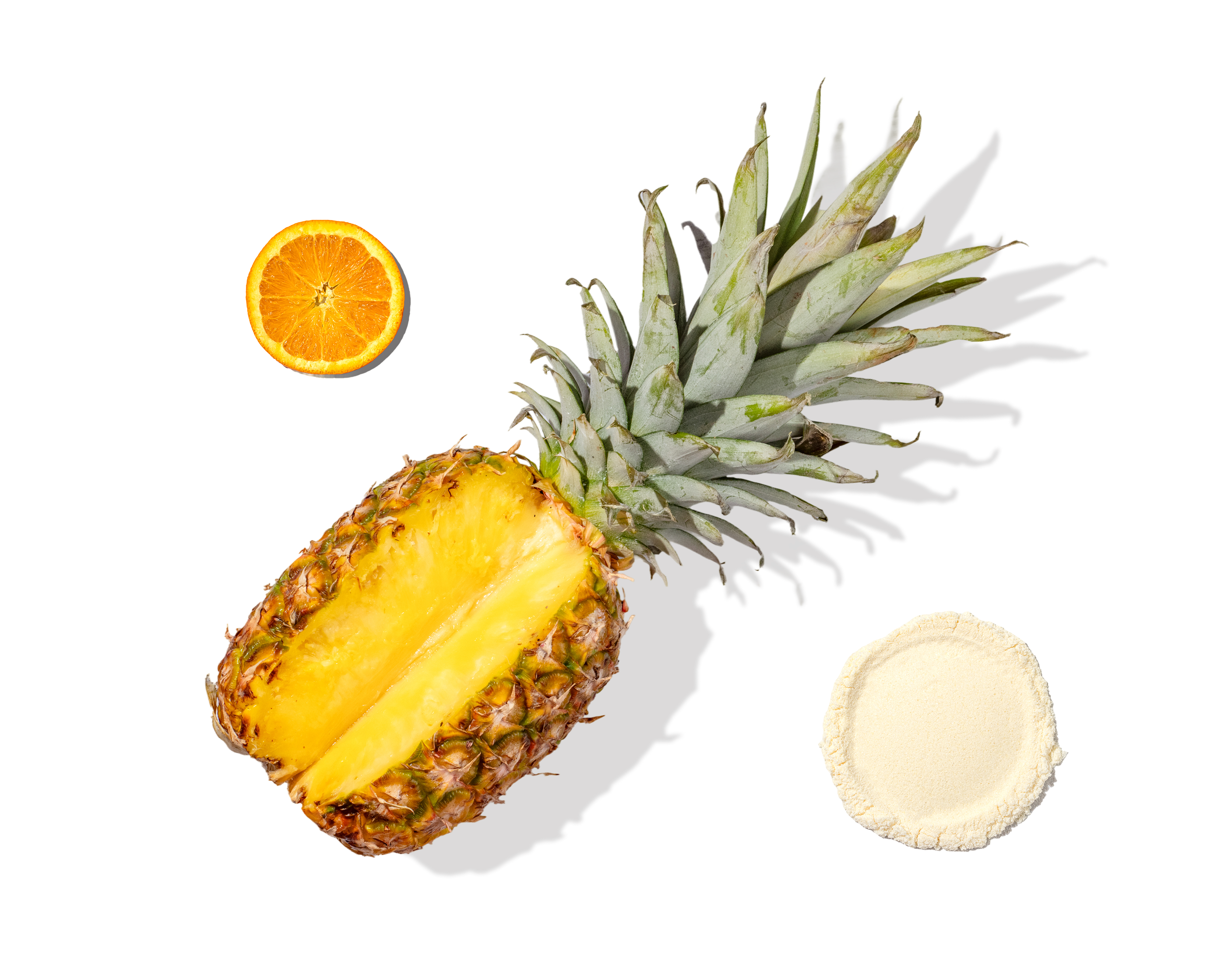 Pineapple half, orange slice, and Happy V supplement powder on a clean white background.