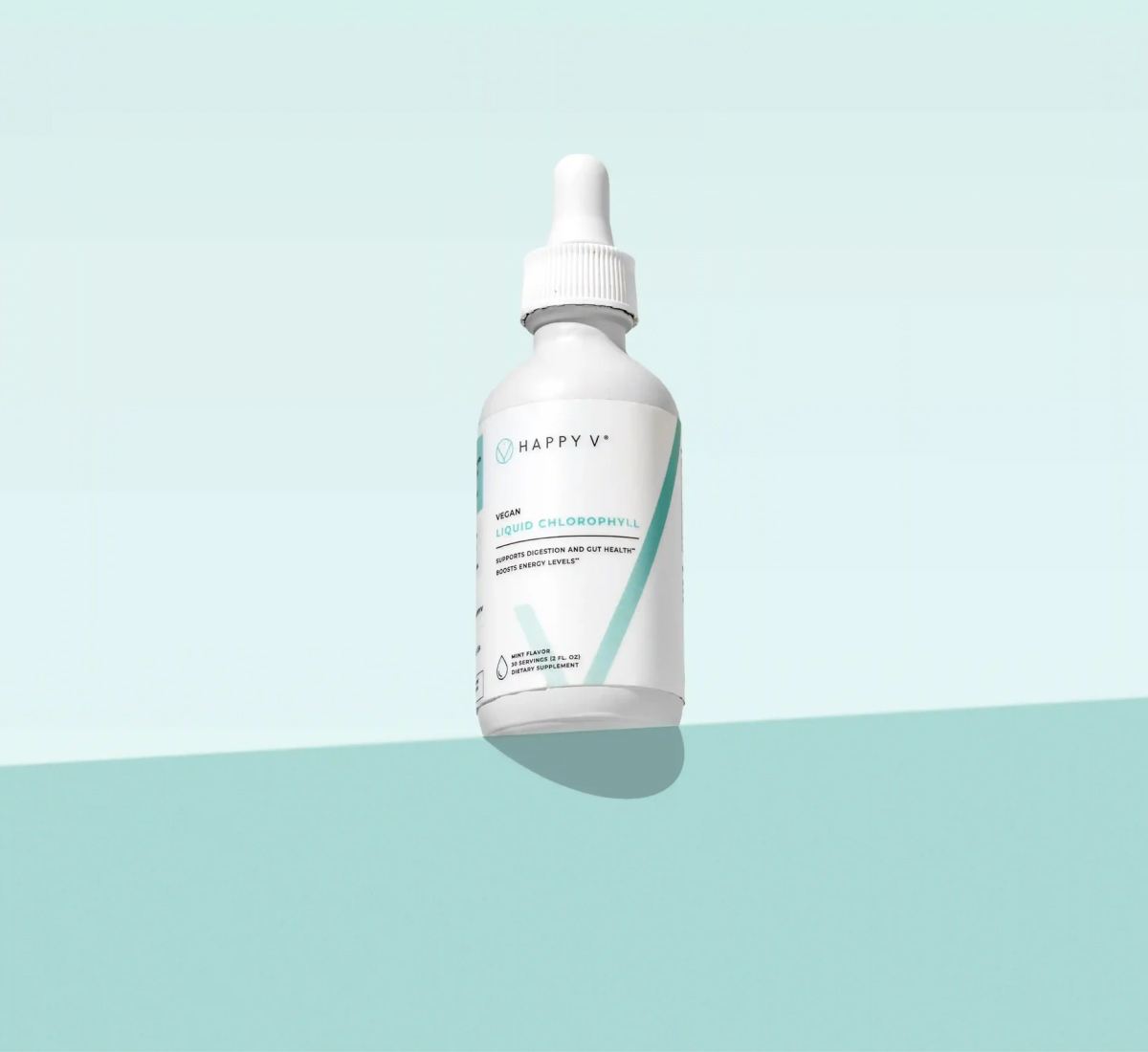 Clear dropper bottle of Happy V supplement with a white label and turquoise accents.