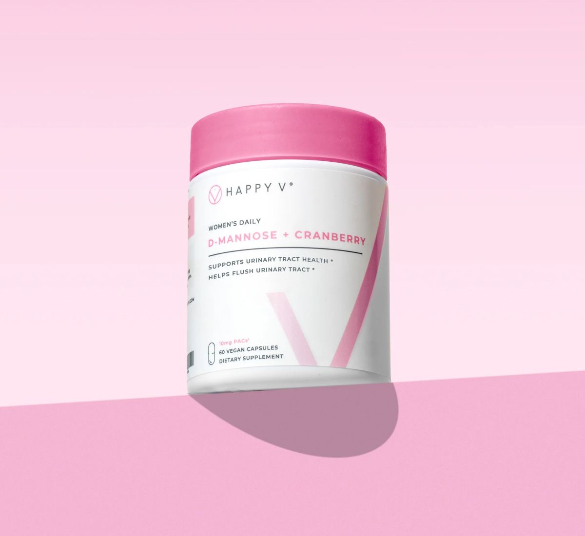 Container of Happy V D-Mannose + Cranberry dietary supplement for women's urinary tract health.