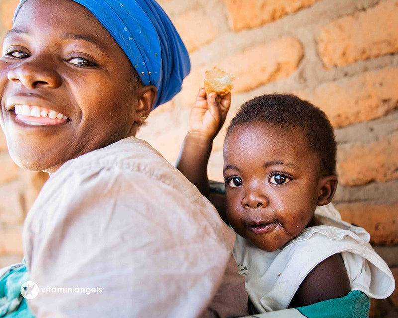African woman with a child