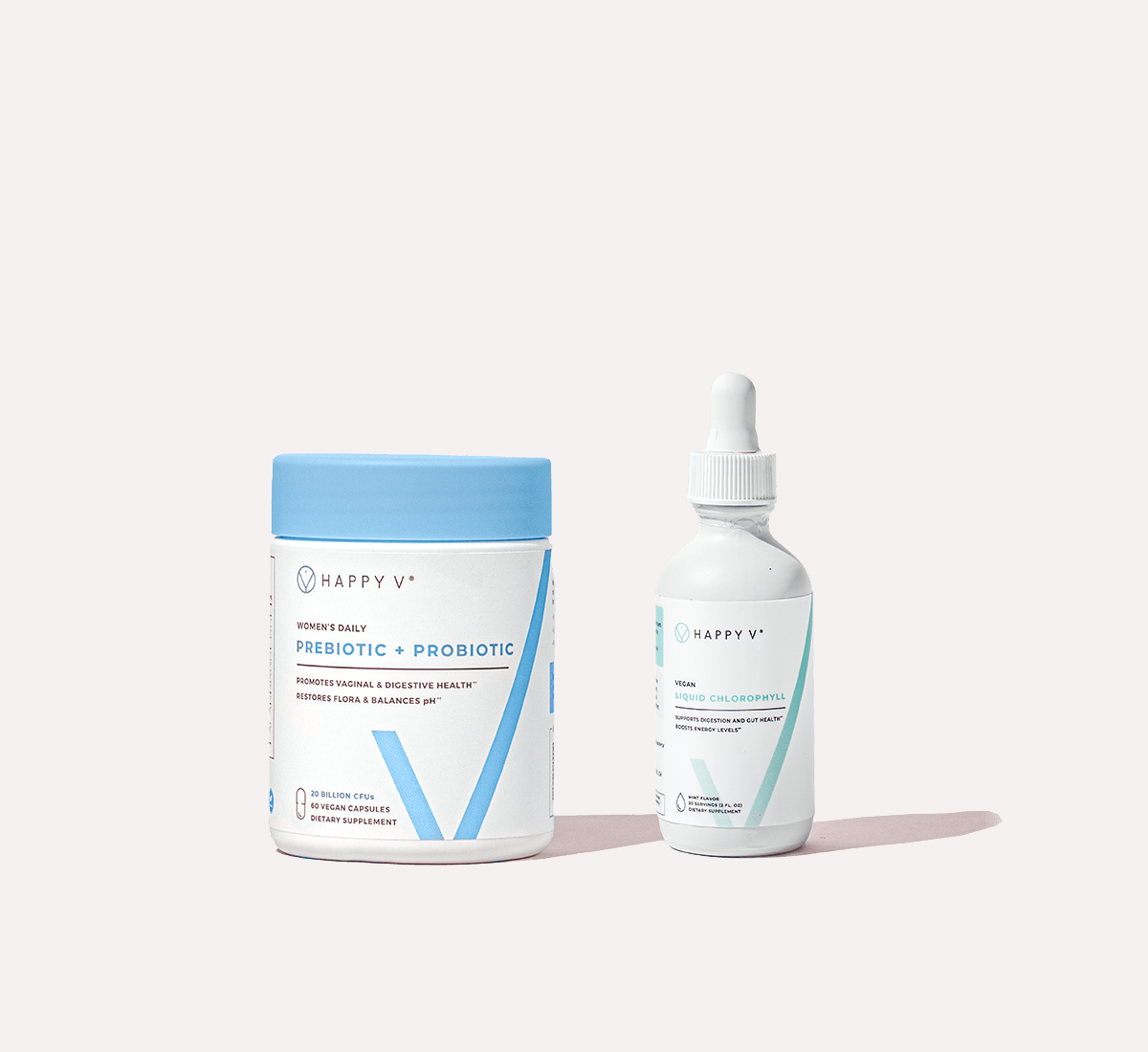 Happy V prebiotic and chlorophyll bottles on neutral background, highlighting wellness.
