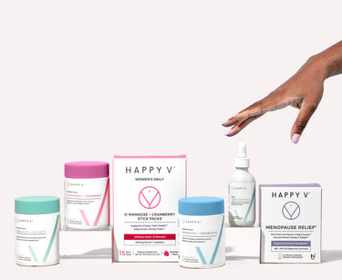 Happy V supplement bottles displayed on a light background, highlighting feminine wellness focus.