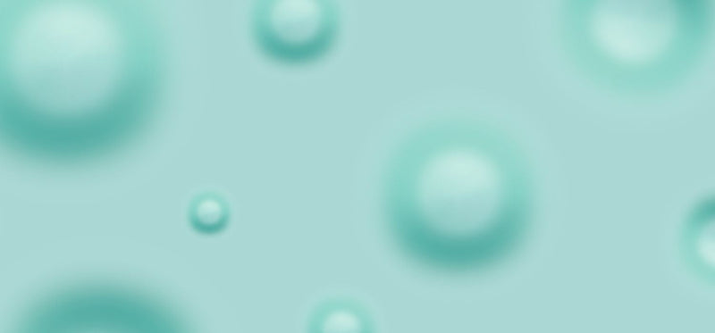 Stylized illustration of small, raised circular bumps on a light background.