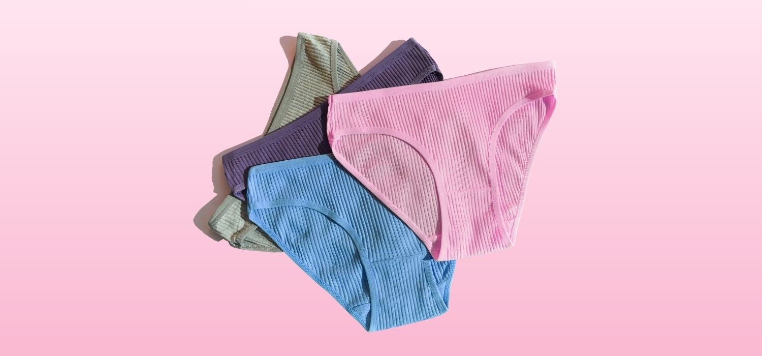 An image of four pairs of women's underwear on a pink background.
