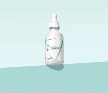 Happy V supplement dropper bottle on a light blue background, emphasizing feminine wellness.