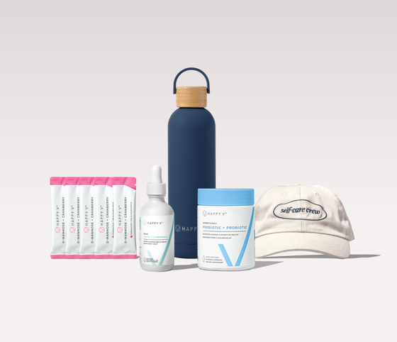 A blue water bottle, supplements, and a hat from Happy V, a women’s wellness brand.