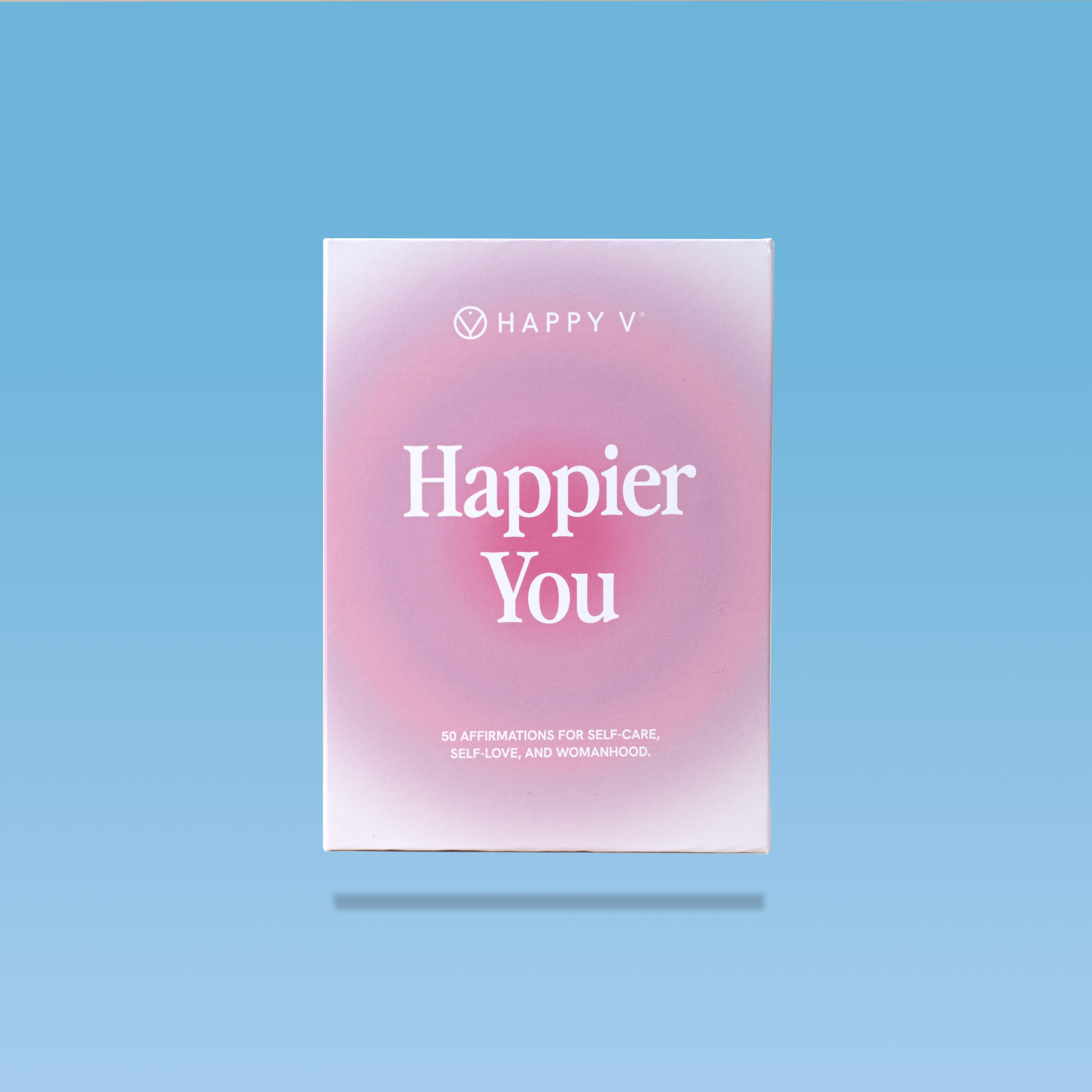 Happy V "Happier You" affirmation box with clean design on a vibrant blue background.
