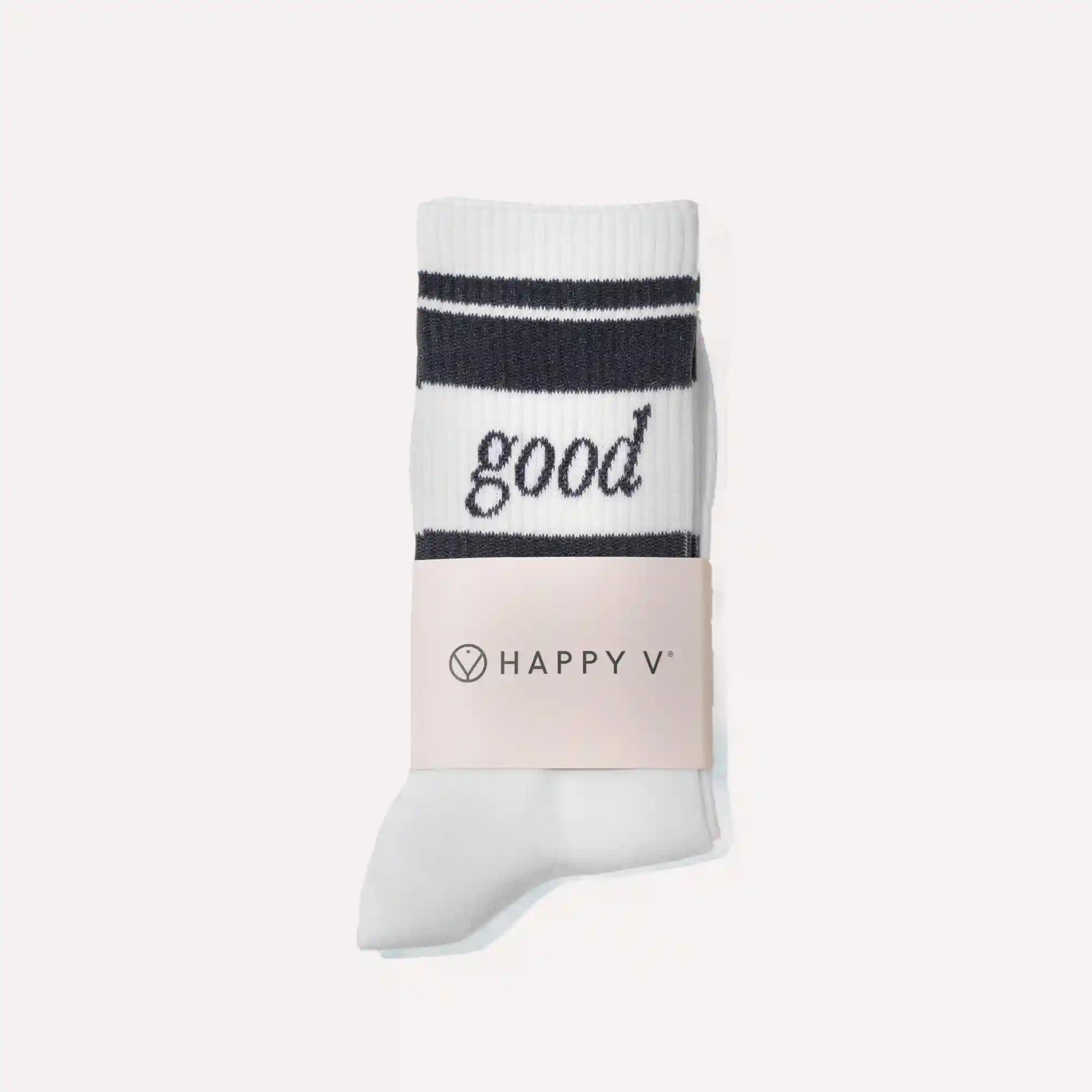 White sock featuring "good" text and Happy V label, symbolizing feminine wellness.