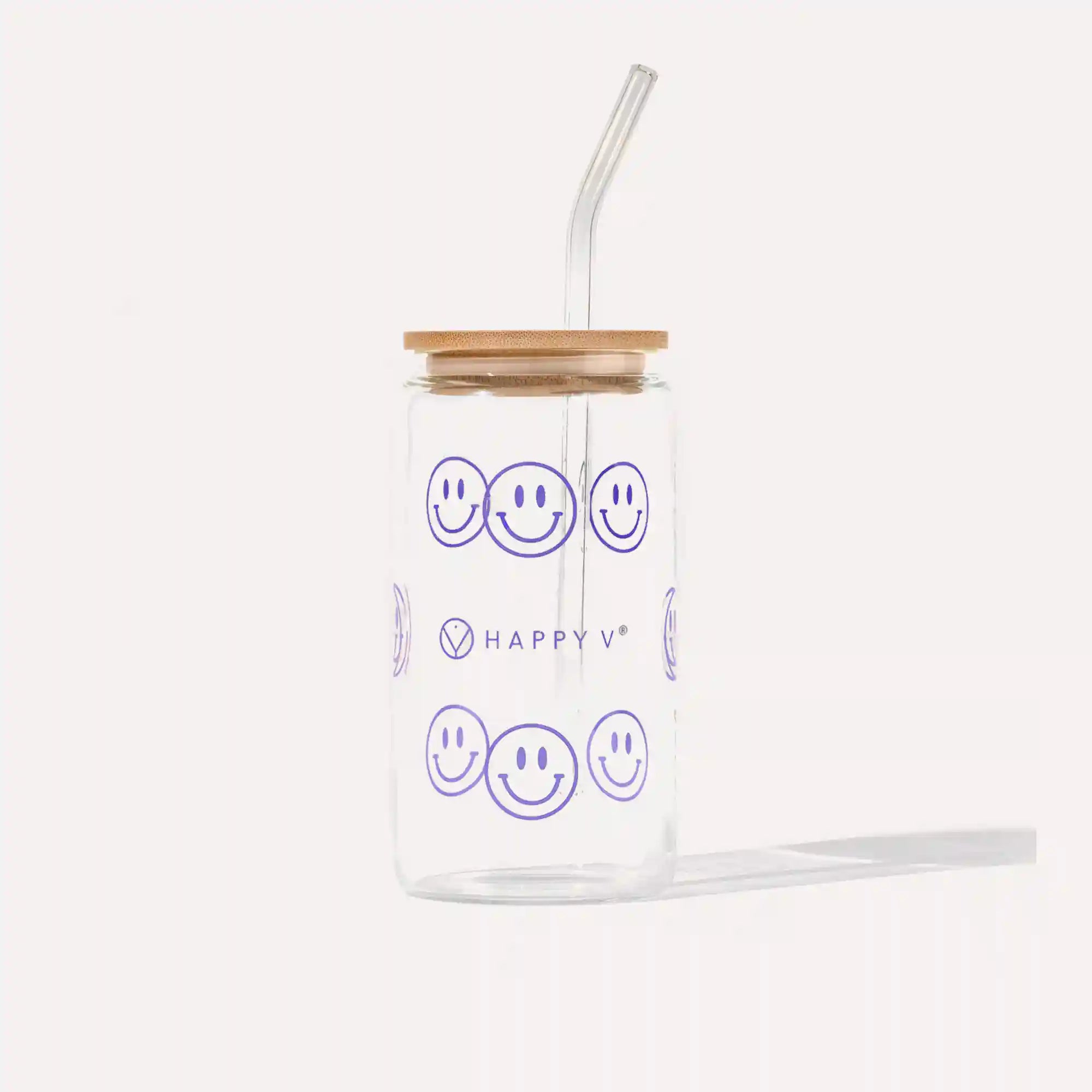 Glass jar with wooden lid featuring smiley faces, symbolizing Happy V's cheerful branding.