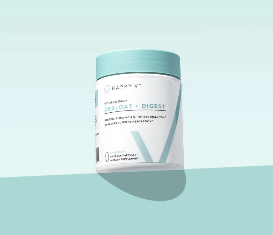 Women’s daily supplement container labeled "Debloat + Digest" by Happy V for gut health.
