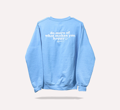 Blue sweatshirt featuring "do more of what makes you happy" text, embodying Happy V's wellness ethos.